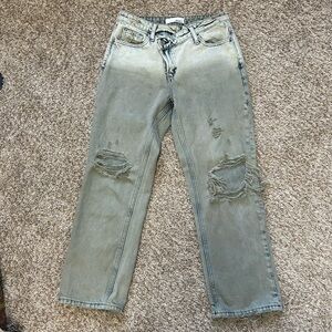 Women Distressed Jeans with Slanted waist band